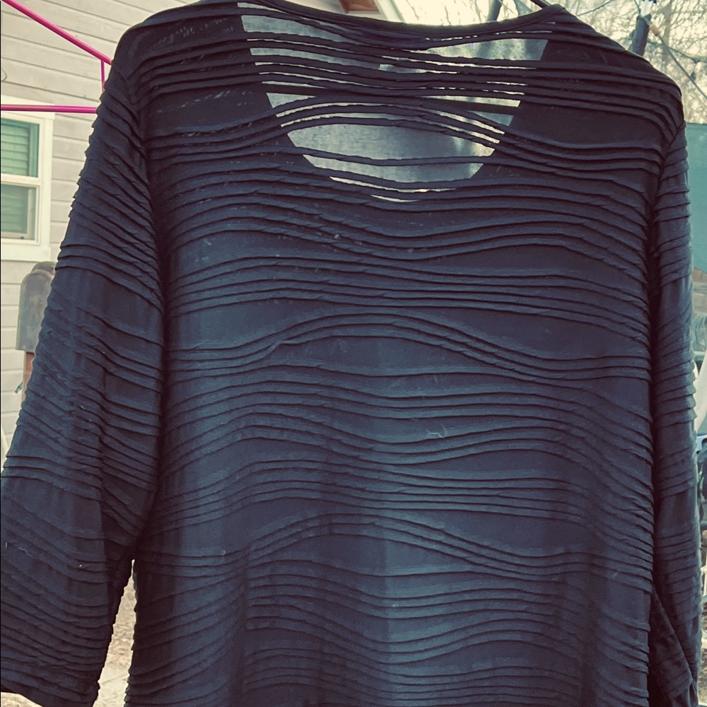 Women’s dress shirt, long with texture.